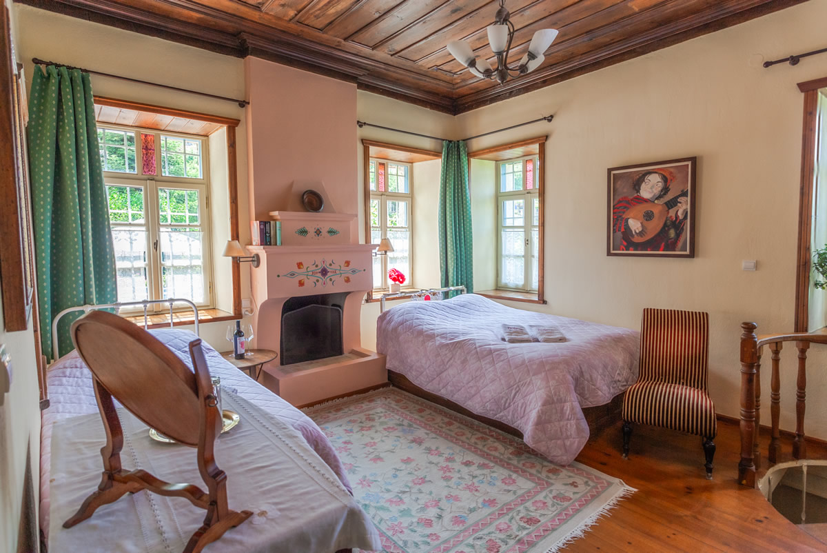 Superior familiekamer met uitzicht op de tuin Een ruime en zonnige familiekamer met een prachtig uitzicht op de tuin.