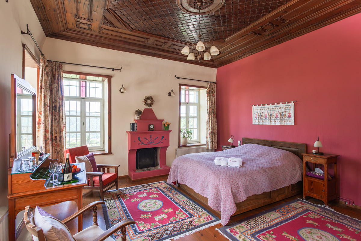 Timfi-kamer, Deluxe Suite Mountain View, een intrigerende en tot in de puntjes verzorgde suite die een vorstelijk verblijf biedt aan gasten die op zoek zijn naar goede smaak en een nog mooier uitzicht.