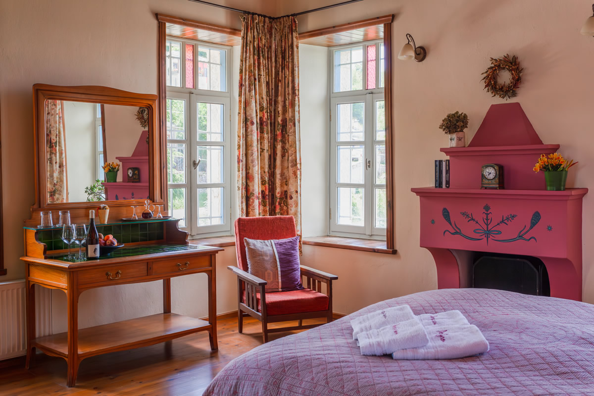 Timfi-kamer, Deluxe Suite Mountain View, een intrigerende en tot in de puntjes verzorgde suite die een vorstelijk verblijf biedt aan gasten die op zoek zijn naar goede smaak en een nog mooier uitzicht.