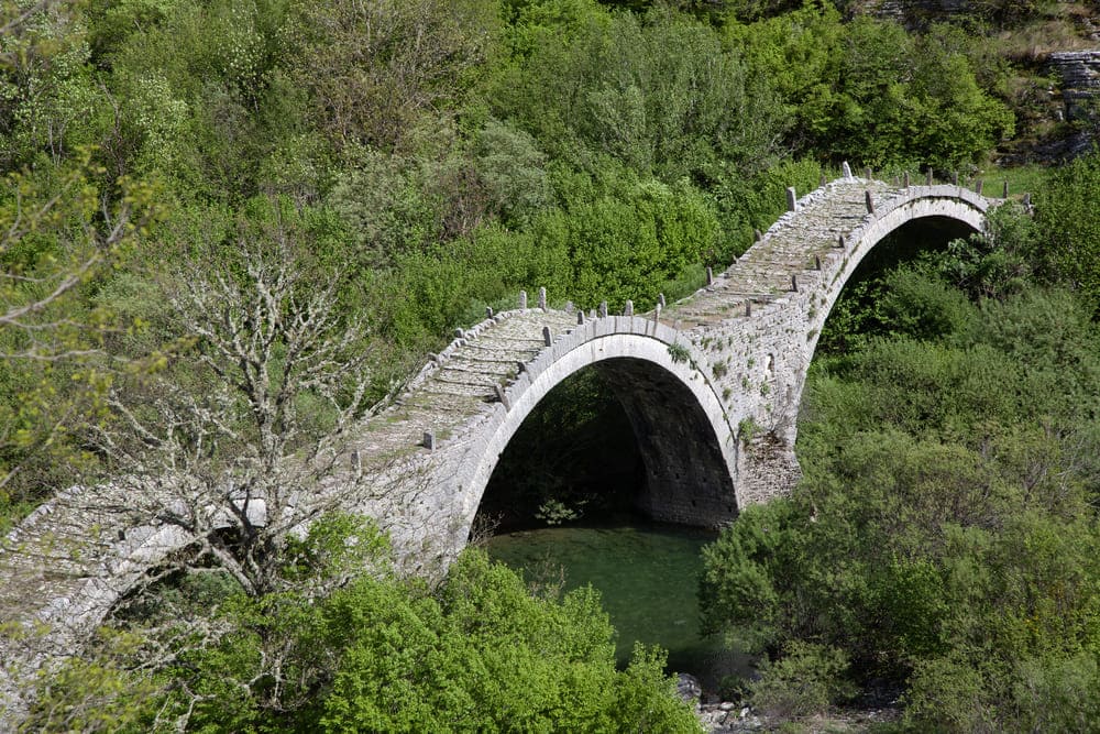 old stone triple arch bridge